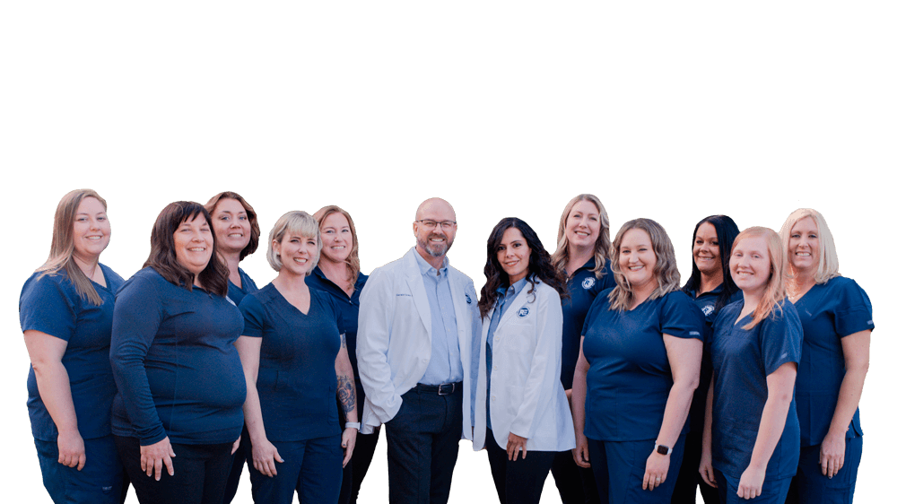 Our Rochester endodontists and team posing for a group picture.