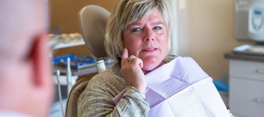 Patient with a sore tooth who needs a root canal or an Apicoemctomy