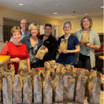 People holding gifts